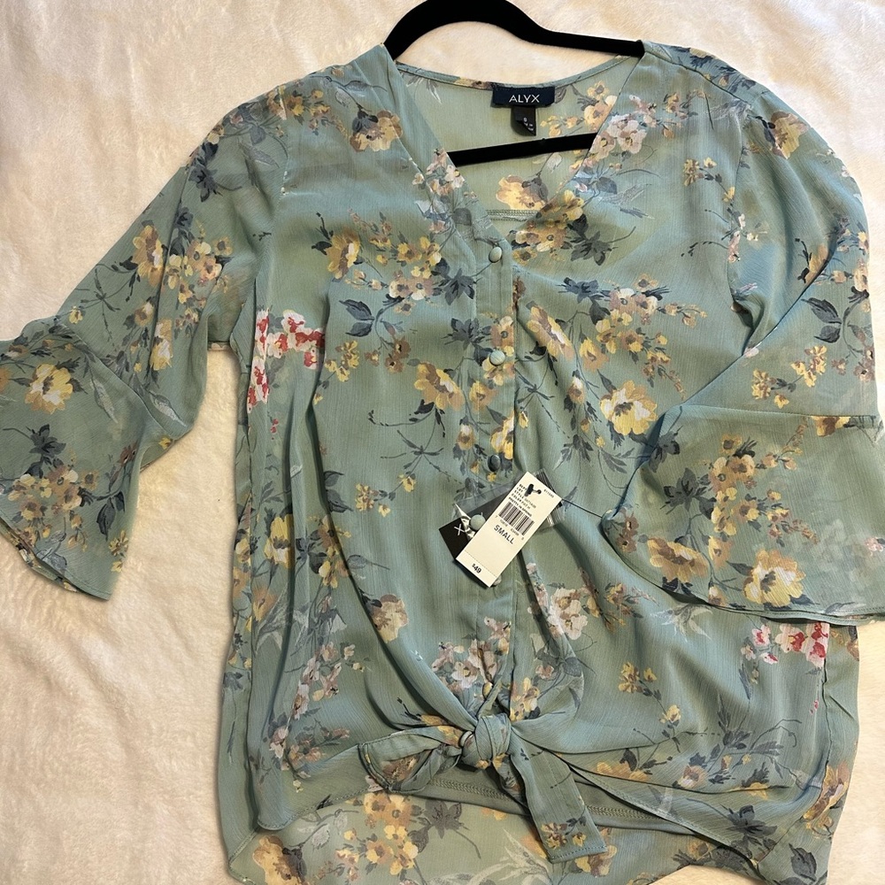 Floral Top. Has built in tank under.